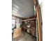 View of the garage featuring shelving at 1404 Plantation Dr # 9, Lady Lake, FL 32159
