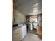 Functional laundry room with washer, dryer, and water heater at 1404 Plantation Dr # 9, Lady Lake, FL 32159