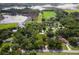 Expansive property features mature trees, pond, and open green spaces at 1436 Spring Lake Rd, Fruitland Park, FL 34731