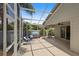 Inviting enclosed lanai with comfortable seating, offering a relaxing space for outdoor enjoyment at 1664 Vinewood Ave, The Villages, FL 32162