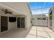 Large screened-in porch with ceiling fan, view to inside, and view to the outdoors at 1664 Vinewood Ave, The Villages, FL 32162