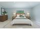 Well-appointed bedroom featuring contemporary décor, natural light, and a soothing ambiance at 17037 Se 76Th Creekside Cir, The Villages, FL 32162