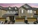 Charming townhome with well-maintained landscaping and a two-car garage at 17439 Promenade Dr, Clermont, FL 34711