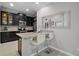 Stylish kitchen with granite countertops and barstool seating at 17439 Promenade Dr, Clermont, FL 34711