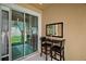Cozy patio space includes a small table and chairs, perfect for relaxing outdoors at 17439 Promenade Dr, Clermont, FL 34711