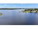 Panoramic lake view, complemented by luxury waterfront homes featuring private docks at 17439 Promenade Dr, Clermont, FL 34711