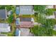 Aerial shot showcasing a home nestled in a lush green neighborhood with a private backyard at 1906 Chathamoor Dr, Orlando, FL 32835