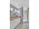 Stylish bathroom featuring dual vessel sinks, granite counters, and glass enclosed shower at 1906 Chathamoor Dr, Orlando, FL 32835