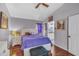 Inviting bedroom with wood floors and adjoining bathroom at 1906 Chathamoor Dr, Orlando, FL 32835