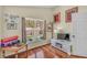 Inviting bedroom with laminated floors and a sunny window overlooking the pool at 1906 Chathamoor Dr, Orlando, FL 32835
