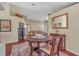 Elegant dining room with wood floors and a view into the living room, creating a spacious and inviting atmosphere at 1906 Chathamoor Dr, Orlando, FL 32835