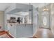 Open kitchen with a breakfast bar, stainless steel appliances, and easy access to the dining area at 1906 Chathamoor Dr, Orlando, FL 32835