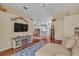 Inviting living room with open layout, fireplace and entertainment center at 1906 Chathamoor Dr, Orlando, FL 32835