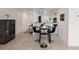 Cozy dining area with a modern table set, perfect for intimate meals and gatherings at 1940 Piedmont Ct, Mascotte, FL 34753