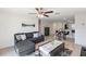 Living area with comfortable seating and a bright view of the outdoors at 1940 Piedmont Ct, Mascotte, FL 34753