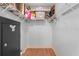 Walk-in closet offering ample storage space with shelving and a safe at 204 Lori Ct, Umatilla, FL 32784