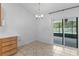 Dining area with access to the backyard pool and patio area at 204 Lori Ct, Umatilla, FL 32784