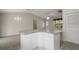 Bright kitchen with adjoining space at 2207 Crawford Ct, The Villages, FL 32162