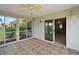 The screened patio is an outdoor retreat for dining and relaxation, conveniently located near the entrance at 2207 Crawford Ct, The Villages, FL 32162