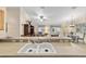 Kitchen counter overlooking a living room and breakfast nook area at 2237 Jetta Way, The Villages, FL 32162