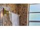 Bathroom featuring a roll of toilet paper and decorative tile at 235 Rockmoore Ct, Deland, FL 32720