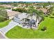 A charming single-story home featuring lush landscaping and a well-manicured lawn at 2455 Five Forks Trl, The Villages, FL 32162