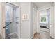 Hallway leading to bathroom and bedroom at 2455 Five Forks Trl, The Villages, FL 32162