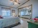 Inviting bedroom with closet mirror and soft lighting, creating a comfortable and relaxing space at 25007 Bellevue, Leesburg, FL 34748