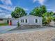 Charming single-story home with a well-maintained yard and attractive landscaping at 25007 Bellevue, Leesburg, FL 34748
