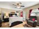 Bedroom features ceiling fan, natural light, and nice decor at 25824 Shawnee St, Sorrento, FL 32776