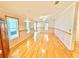 Expansive living room boasts hardwood floors and neutral colored walls at 2585 Karen Dr, Mount Dora, FL 32757