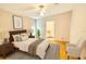 Stylishly furnished bedroom with sleek furniture and soft, modern accents at 2585 Karen Dr, Mount Dora, FL 32757