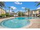 Community pool with a fountain at 2639 Maitland Crossing Way # 102, Orlando, FL 32810
