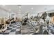 Community gym with treadmill, elliptical, stair stepper, and weight-lifting machines at 2639 Maitland Crossing Way # 102, Orlando, FL 32810