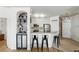 Bright kitchen with stainless steel appliances and breakfast bar seating, perfect for entertaining guests at 2639 Maitland Crossing Way # 102, Orlando, FL 32810