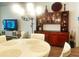Dining area featuring wooden accents and a rustic china cabinet at 2648 Maymont Ct, The Villages, FL 32163