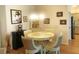 Inviting dining area featuring a round table and elegant decor at 2648 Maymont Ct, The Villages, FL 32163