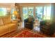 Comfortable living room area with furniture and access to outdoor space at 2648 Maymont Ct, The Villages, FL 32163