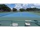 Community tennis courts offer an inviting space for friendly competition and active recreation at 27141 Racquet Cir, Leesburg, FL 34748