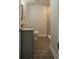Modern bathroom offers granite counters, stylish vanity, and tiled walk-in shower at 2961 Northland Rd, Mount Dora, FL 32757