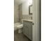 Bathroom features a tub, granite counters and a modern vanity with tile floors at 2961 Northland Rd, Mount Dora, FL 32757