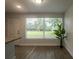Bright dining area features wood floors and a large window with views of the spacious yard at 2961 Northland Rd, Mount Dora, FL 32757