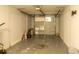 Attached one car garage offers secure parking and additional storage space for tools and equipment at 2961 Northland Rd, Mount Dora, FL 32757