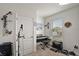 Bonus room featuring a piano, musical instruments, and natural light from a window at 30422 Pintail Dr, Leesburg, FL 34748