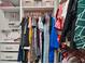 Walk-in closet showcasing organized hanging rods and shelves, providing ample storage space at 30422 Pintail Dr, Leesburg, FL 34748