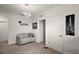 Cozy sitting nook features a modern loveseat and unique decor at 30422 Pintail Dr, Leesburg, FL 34748