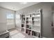 Upper hallway features a bookshelf with room for decor at 30422 Pintail Dr, Leesburg, FL 34748