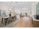 Open-concept living space featuring stylish decor, elegant lighting, and a seamless flow for modern living at 3057 Saint Thomas Ln, The Villages, FL 32162