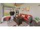 Comfortable screened-in patio featuring stylish furniture and an outdoor grill at 3057 Saint Thomas Ln, The Villages, FL 32162