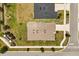 Aerial view of a single-Gathering home with a well-maintained lawn and landscaping at 3260 Casa Del Rey Ave, Kissimmee, FL 34746
